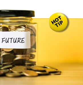 Glass jar labeled FUTURE filled with coins next to a yellow HOT TIP badge, symbolizing financial planning and future savings advice