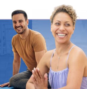 Two smiling people during a wellness or fitness activity with blue background
