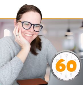 Smiling woman with glasses holding her face, with a clock showing 60 minutes representing a Populi program session duration