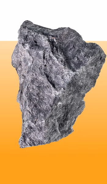 Rough gray stone fragment against gradient orange background, representing strength and stability